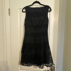 Jessica Simpson black lace dress with gold stripes